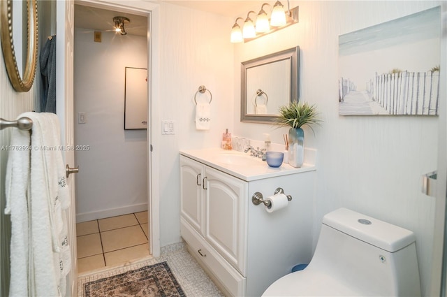 581 Blue Heron Dr Unit 112-B, Hallandale Beach, FL 33009 - bathroom with toilet, vanity, and tile patterned flooring