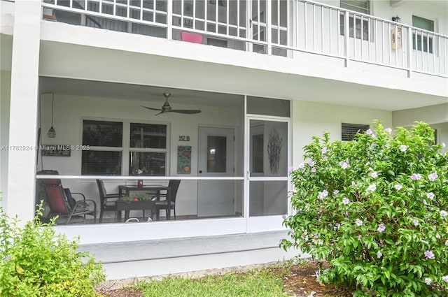 581 Blue Heron Dr Unit 112-B, Hallandale Beach, FL 33009 - rear view of property featuring a porch and stucco siding