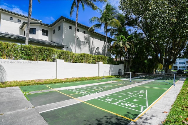 581 Blue Heron Dr Unit 112-B, Hallandale Beach, FL 33009 - view of property's community featuring shuffleboard and fence