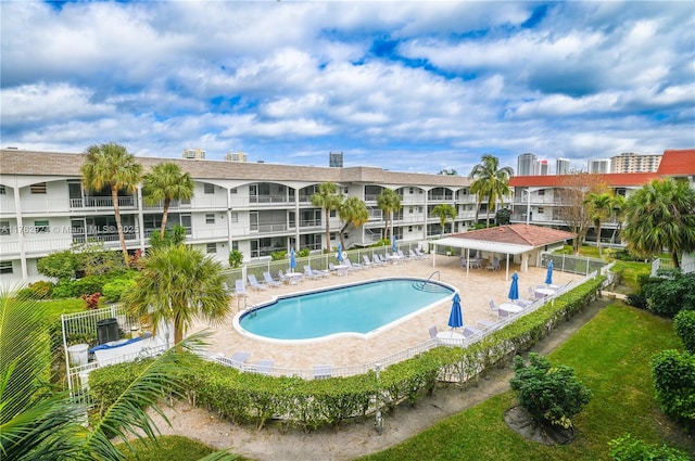 581 Blue Heron Dr Unit 112-B, Hallandale Beach, FL 33009 - pool with a patio area and fence