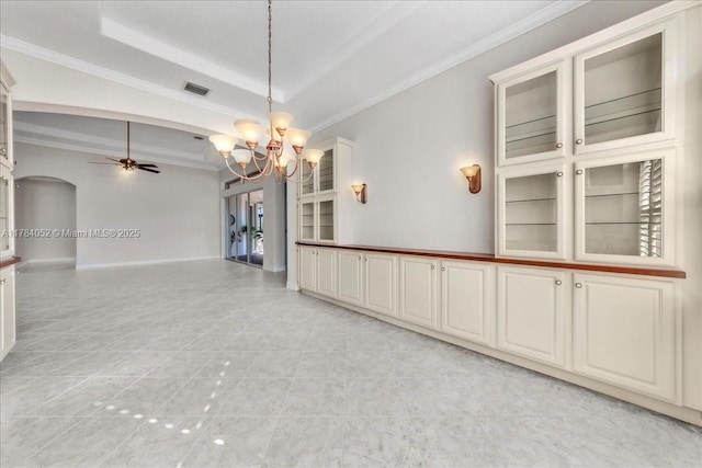 12580 NW 76th St, Parkland, FL 33076 - unfurnished room with a chandelier, ceiling fan, arched walkways, ornamental molding, and light tile patterned floors