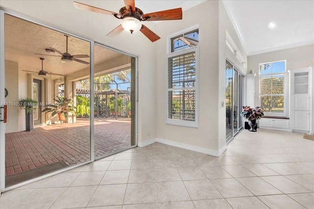12580 NW 76th St, Parkland, FL 33076 - unfurnished sunroom with tile patterned flooring, baseboards, and ornamental molding