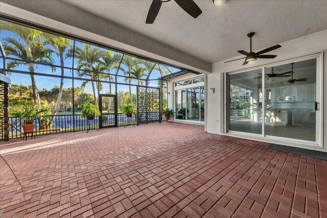 12580 NW 76th St, Parkland, FL 33076 - unfurnished sunroom with a ceiling fan
