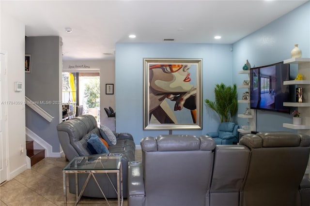 living area with stairway, tile patterned flooring, visible vents, and recessed lighting