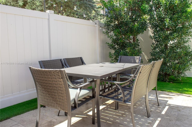 view of patio / terrace with fence and outdoor dining area