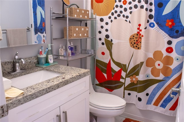 full bathroom with toilet, a shower with shower curtain, and vanity