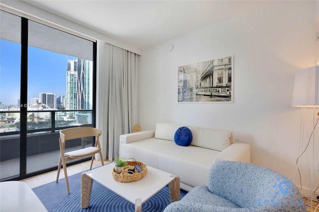 601 NE 1st Ave Unit 1602, Miami, FL 33132 - living area with floor to ceiling windows, a city view, and wood finished floors