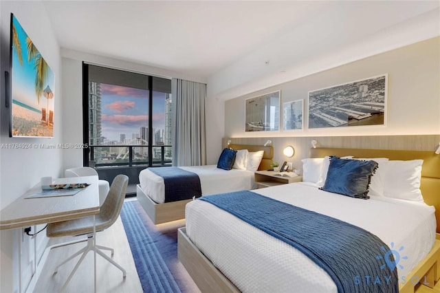 601 NE 1st Ave Unit 1602, Miami, FL 33132 - bedroom featuring a city view and floor to ceiling windows