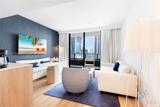 601 NE 1st Ave Unit 1602, Miami, FL 33132 - interior space with a wall of windows and wood finished floors