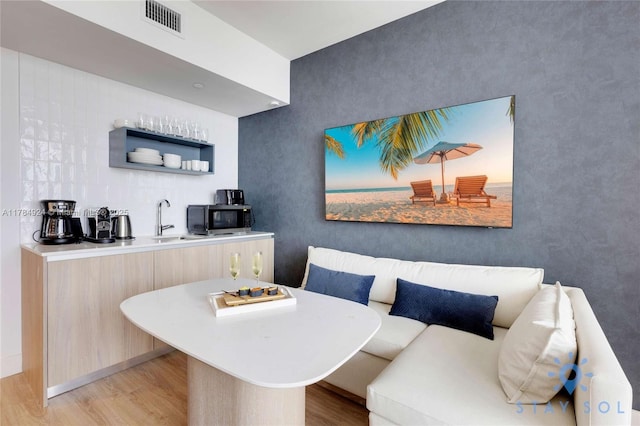 601 NE 1st Ave Unit 1602, Miami, FL 33132 - dining area with visible vents and light wood-style floors