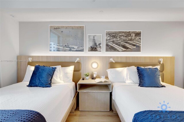 601 NE 1st Ave Unit 1602, Miami, FL 33132 - bedroom featuring wood finished floors