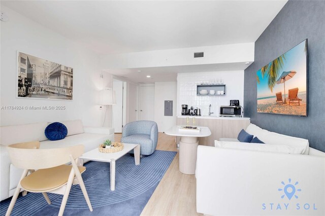 601 NE 1st Ave Unit 1602, Miami, FL 33132 - living area with wood finished floors and visible vents