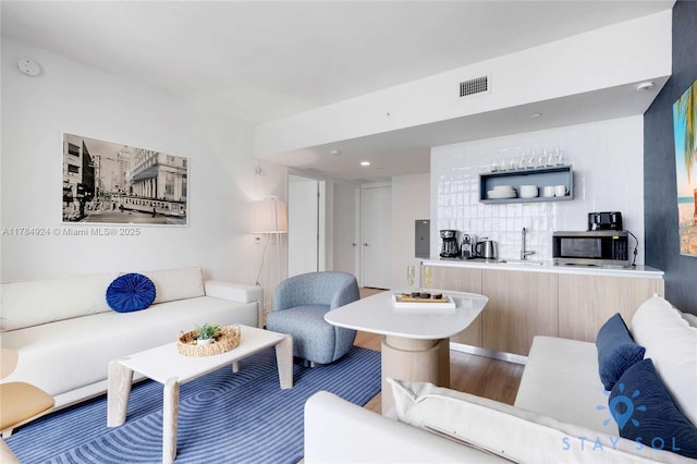 601 NE 1st Ave Unit 1602, Miami, FL 33132 - living room with wood finished floors and visible vents