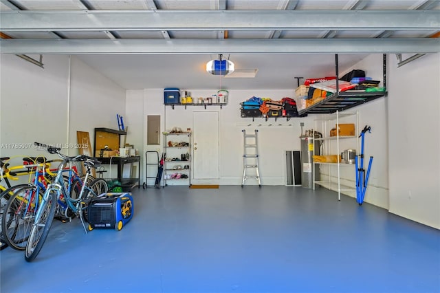 garage with electric water heater, a garage door opener, and electric panel