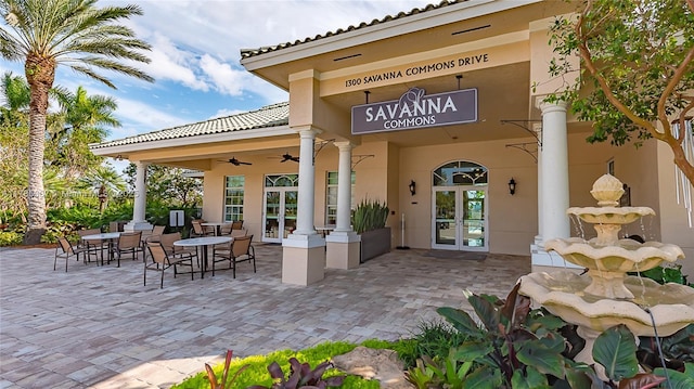 view of patio / terrace featuring french doors and ceiling fan