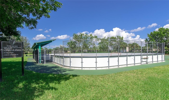 exterior space featuring a yard and fence