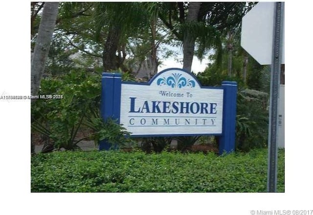 view of community sign