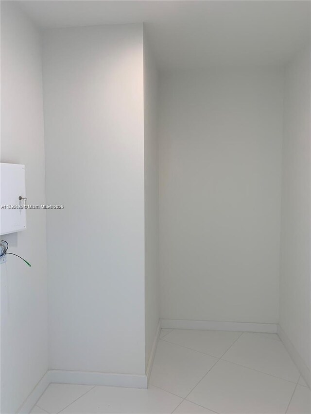 851 NE 1st Ave Unit 3002, Miami, FL 33132 - bathroom featuring baseboards and tile patterned flooring