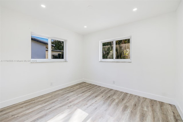 221 SW 28th Ter, Fort Lauderdale, FL 33312 - empty room featuring wood finished floors, baseboards, and plenty of natural light