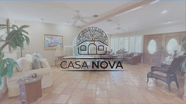 living area featuring a ceiling fan and beamed ceiling