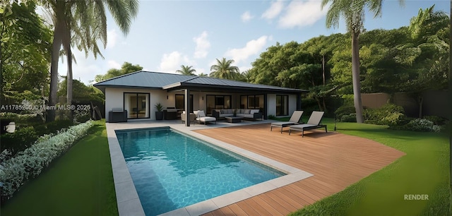 back of property featuring outdoor lounge area, a deck, an outdoor pool, metal roof, and fence