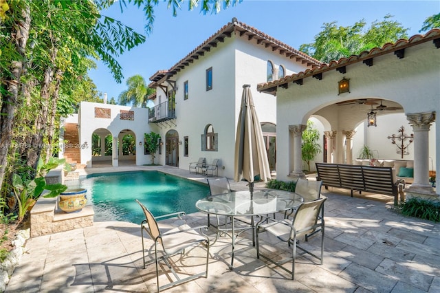 1511 Alegriano Ave, Coral Gables, FL 33146 - exterior space with a balcony, stucco siding, an outdoor living space, a patio area, and ceiling fan