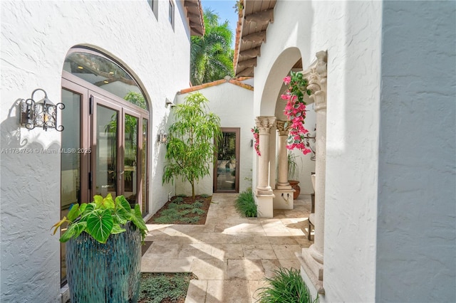 1511 Alegriano Ave, Coral Gables, FL 33146 - property entrance featuring french doors and stucco siding