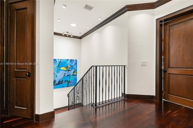 1511 Alegriano Ave, Coral Gables, FL 33146 - hall featuring ornamental molding, visible vents, an upstairs landing, and wood finished floors