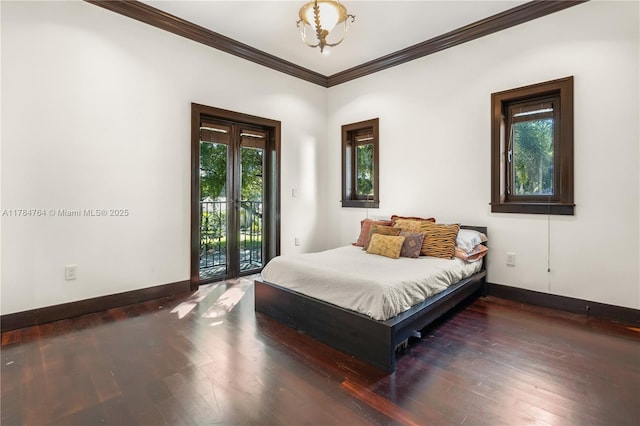 1511 Alegriano Ave, Coral Gables, FL 33146 - bedroom with crown molding, baseboards, access to outside, and wood finished floors