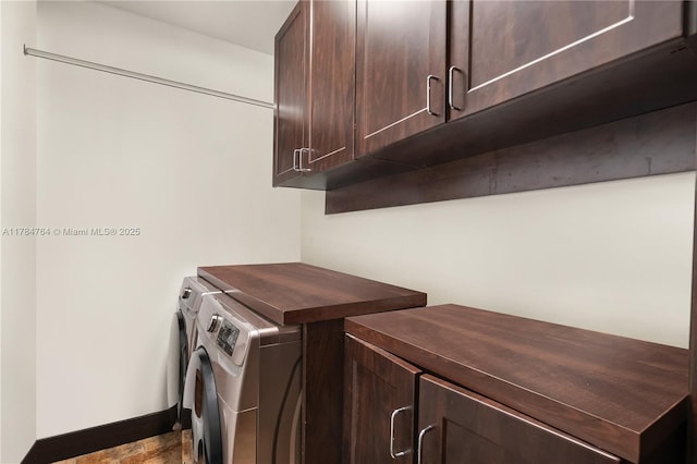 1511 Alegriano Ave, Coral Gables, FL 33146 - laundry area with washer and dryer, baseboards, and cabinet space