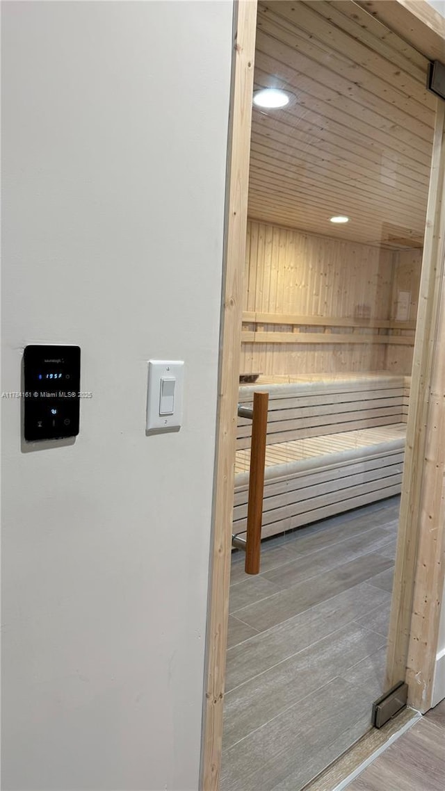 view of sauna with recessed lighting and wood finished floors
