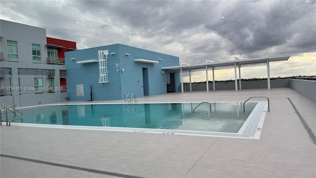 pool featuring a patio