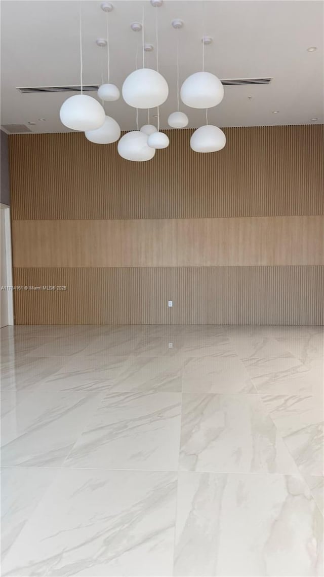 interior space with marble finish floor