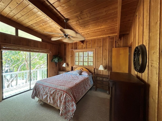 bedroom with carpet floors, wood ceiling, wooden walls, and access to exterior