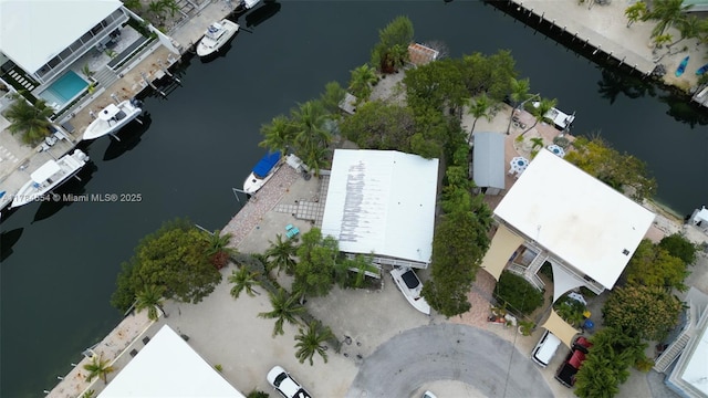 bird's eye view with a water view