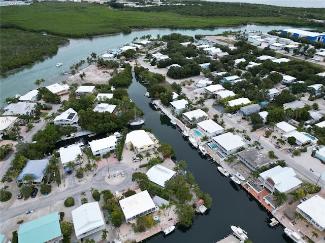 aerial view featuring a residential view and a water view