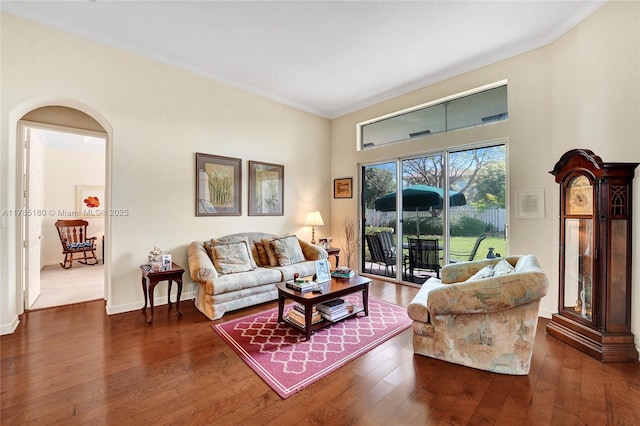 1951 NW 167th Ter, Pembroke Pines, FL 33028 - living room with arched walkways, wood-type flooring, baseboards, and ornamental molding