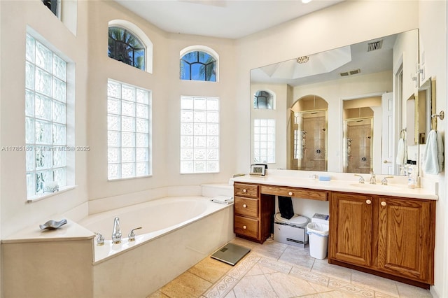 1951 NW 167th Ter, Pembroke Pines, FL 33028 - bathroom featuring a shower stall, a healthy amount of sunlight, and visible vents