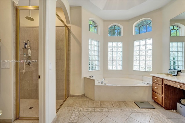1951 NW 167th Ter, Pembroke Pines, FL 33028 - full bathroom featuring a bath, a healthy amount of sunlight, and a stall shower