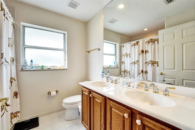 1951 NW 167th Ter, Pembroke Pines, FL 33028 - bathroom featuring toilet, tile patterned flooring, a sink, and visible vents