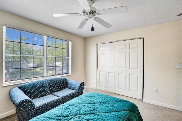 1951 NW 167th Ter, Pembroke Pines, FL 33028 - bedroom featuring light carpet, a textured ceiling, baseboards, a closet, and ceiling fan
