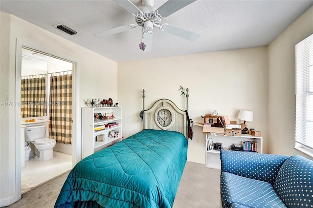 1951 NW 167th Ter, Pembroke Pines, FL 33028 - carpeted bedroom featuring ensuite bath, visible vents, and a ceiling fan