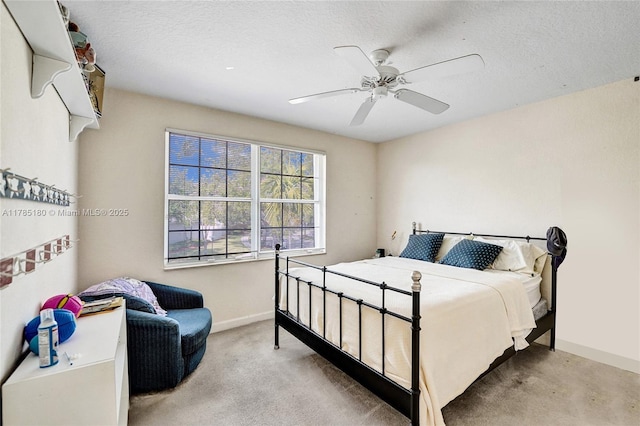 1951 NW 167th Ter, Pembroke Pines, FL 33028 - bedroom featuring baseboards, a textured ceiling, light colored carpet, and ceiling fan
