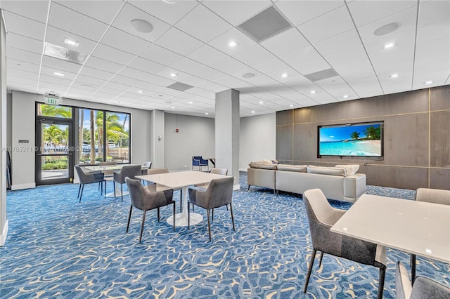 90 Edgewater Dr Unit 624, Coral Gables, FL 33133 - dining space featuring carpet floors, baseboards, recessed lighting, and wood walls