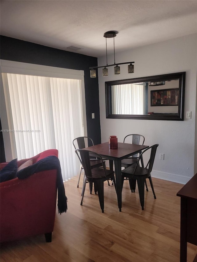 13799 SW 147th Cir Ln Unit 3, Miami, FL 33186 - dining space with wood finished floors and baseboards