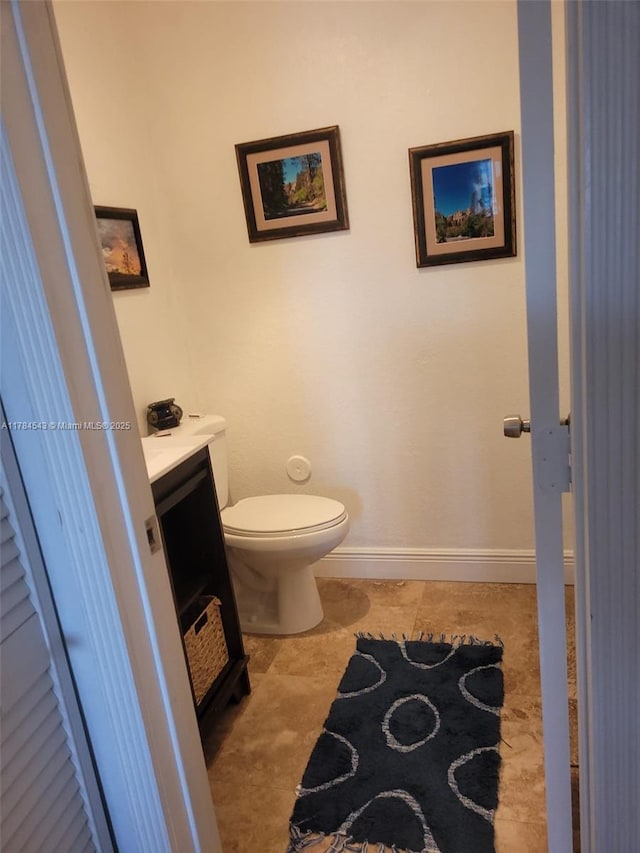 13799 SW 147th Cir Ln Unit 3, Miami, FL 33186 - bathroom with baseboards, vanity, and toilet