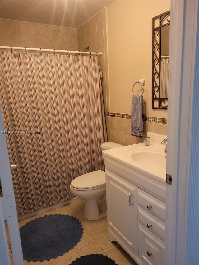 13799 SW 147th Cir Ln Unit 3, Miami, FL 33186 - full bath featuring tile patterned floors, vanity, curtained shower, tile walls, and toilet
