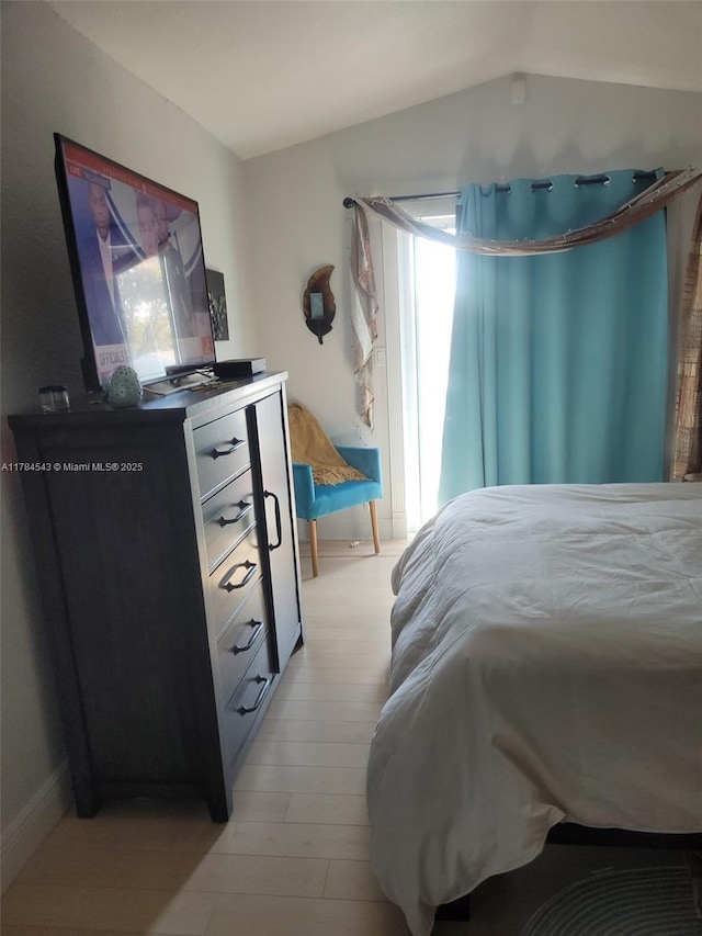 13799 SW 147th Cir Ln Unit 3, Miami, FL 33186 - bedroom featuring lofted ceiling, baseboards, and multiple windows