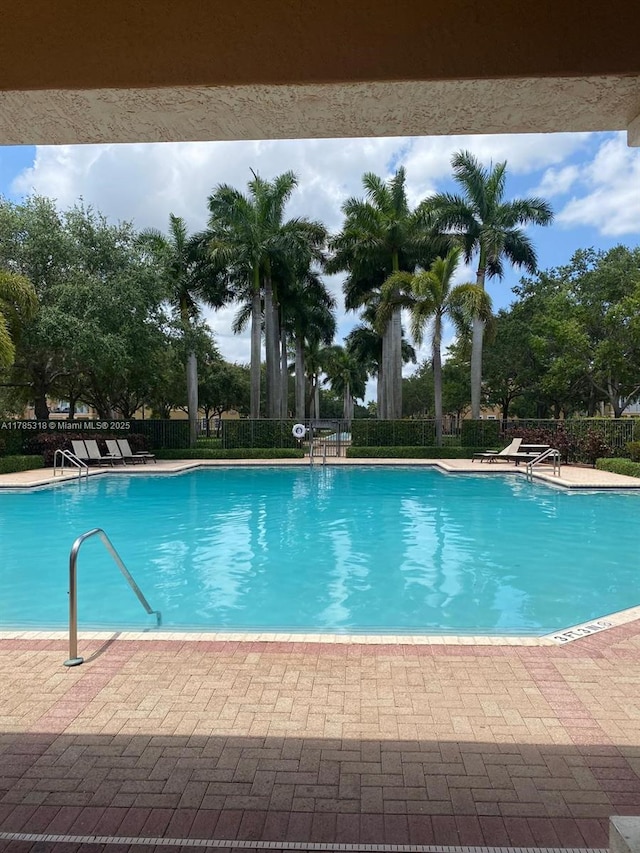 964 SW 147th Ave Unit 2606, Pembroke Pines, FL 33027 - community pool featuring a patio area
