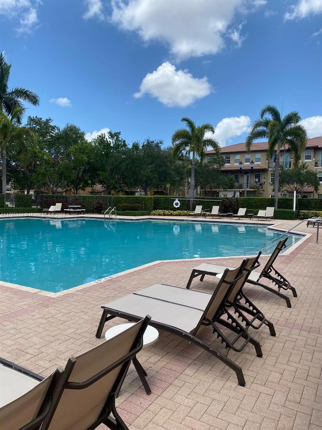 964 SW 147th Ave Unit 2606, Pembroke Pines, FL 33027 - community pool featuring a patio area